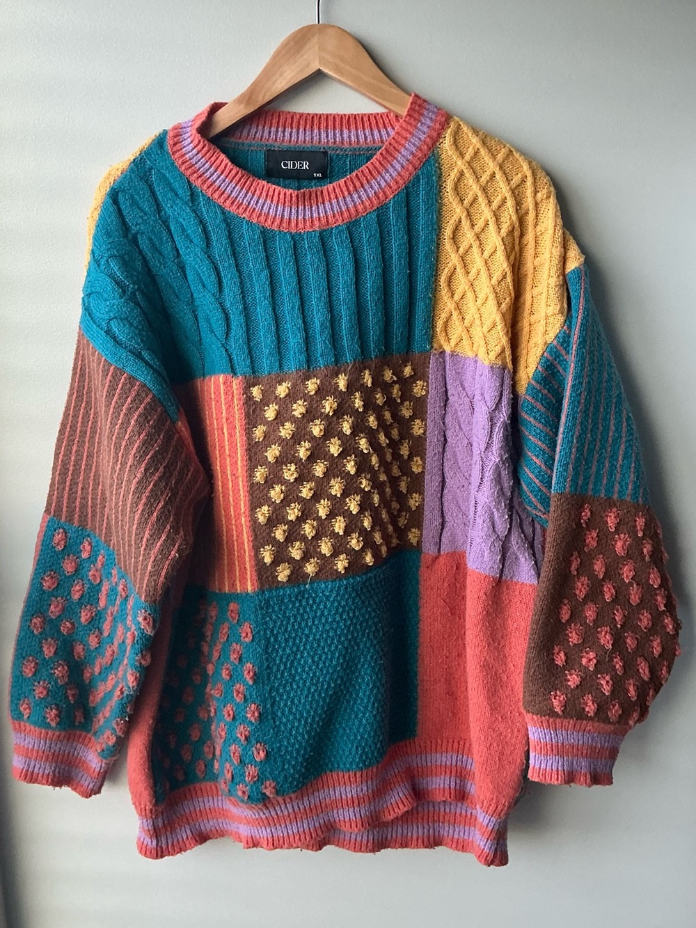 Womenโs multi-color color block sweater